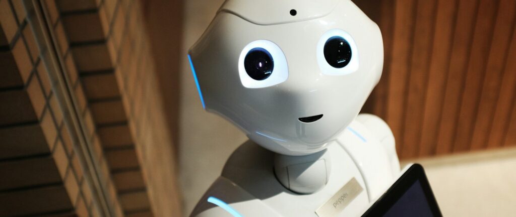 white robot near brown wall