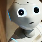 white robot near brown wall