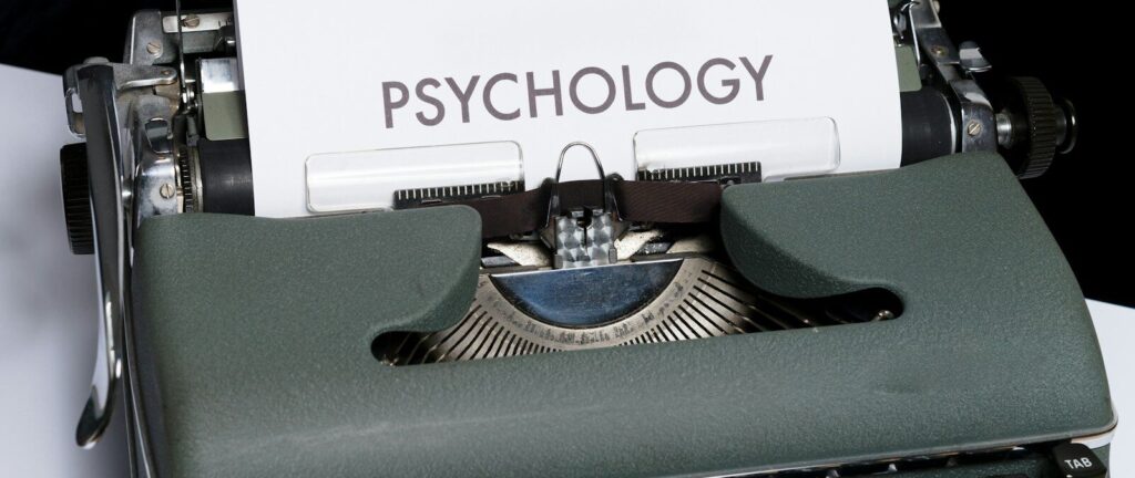 a close up of a typewriter with a paper on it