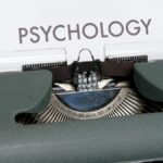 a close up of a typewriter with a paper on it