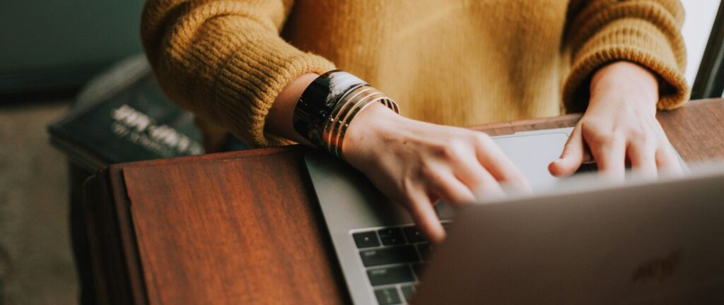 person using laptop computer