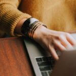 person using laptop computer