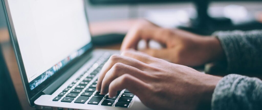 person using MacBook Pro