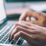 person using MacBook Pro