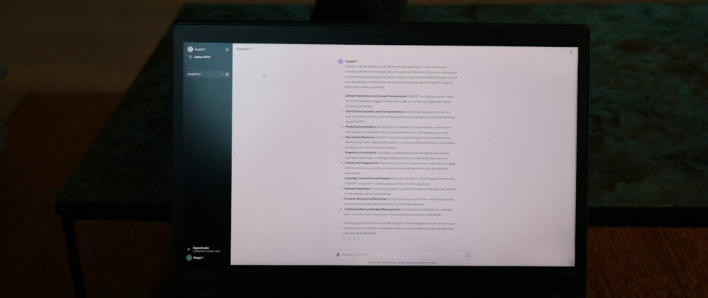 a person's feet resting on a computer screen