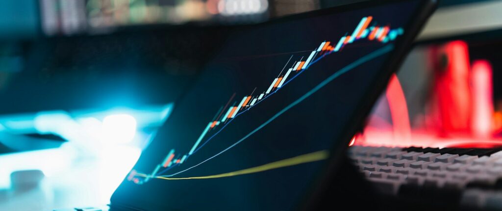 A laptop computer sitting on top of a desk